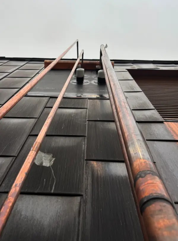 New hot-water reheat piping on Unistrut supports on the roof of Paul LeBlanc Hall